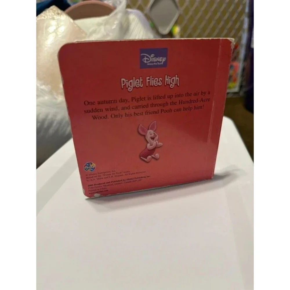Piglet flies high board book